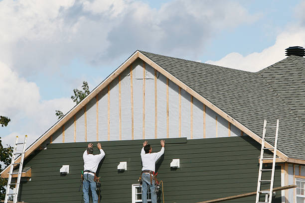 Professional Siding technician working in Beverly, MA